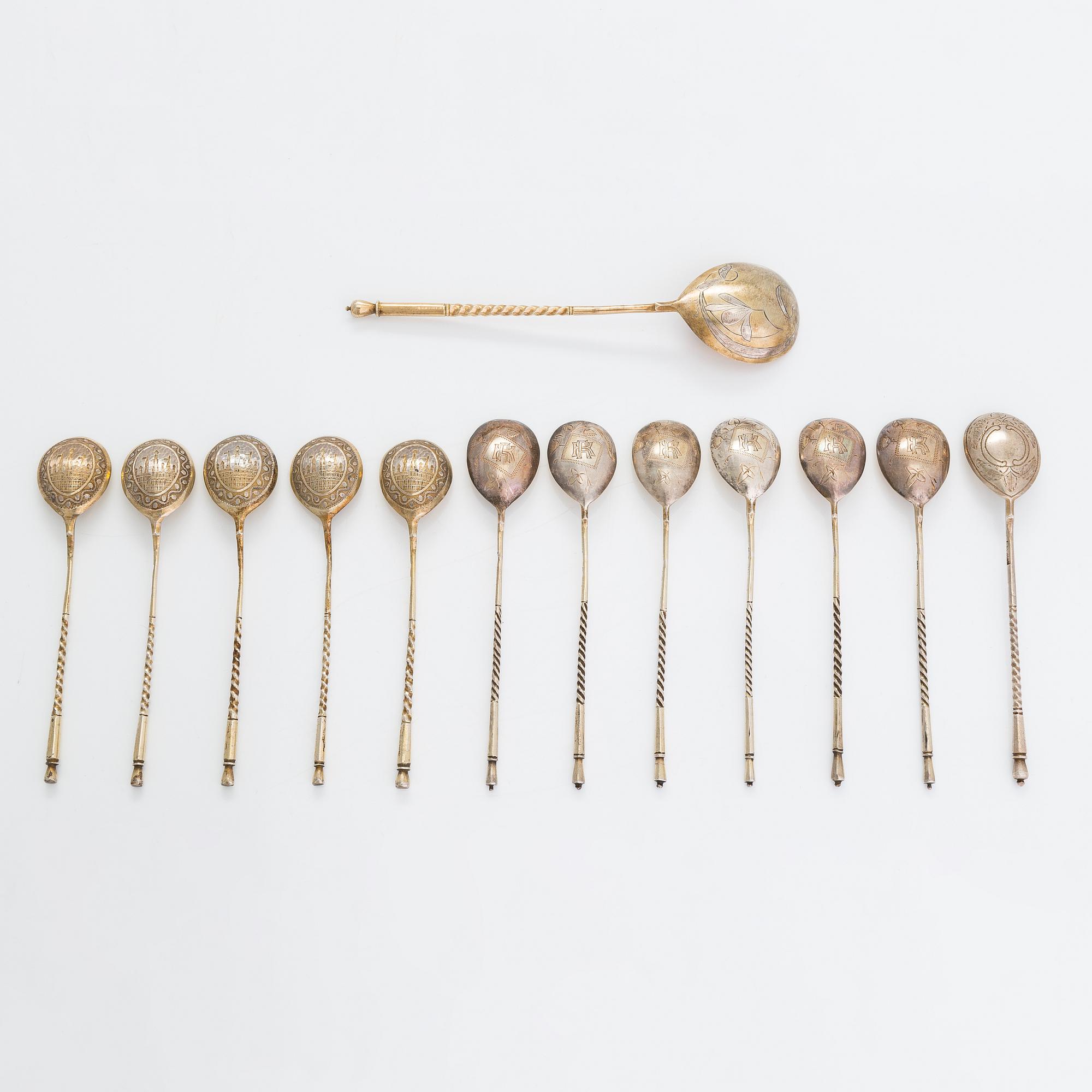 Twelve parcel-gilt teaspoons and a jam spoon, Russia 1887-1926.
