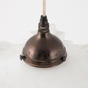 An early 20th century lamp.