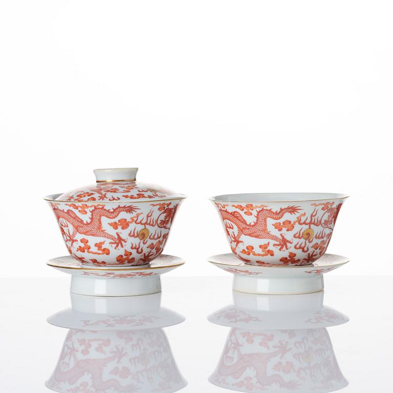 A pair of five clawed dragon bowls on stands and a cover, Qing dynasty, Daoguang mark and period (1821-50).