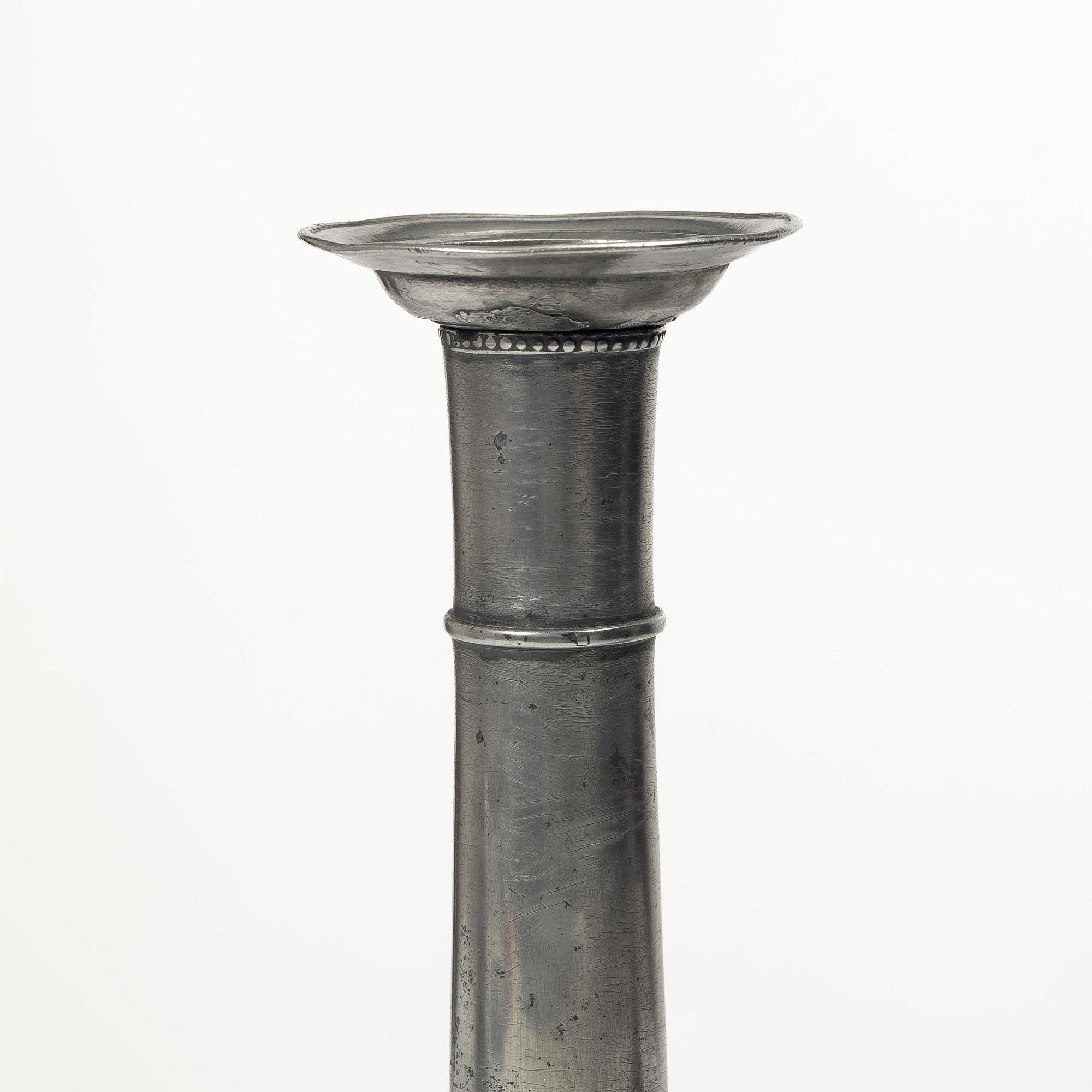 A pair of late gustavian pewter candlesticks attr. to Hans Wicksten (master in Västerås 1782-1810/14).