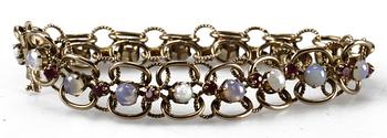 ARMLÄNK, 14 K guld, rubiner samt stenar.