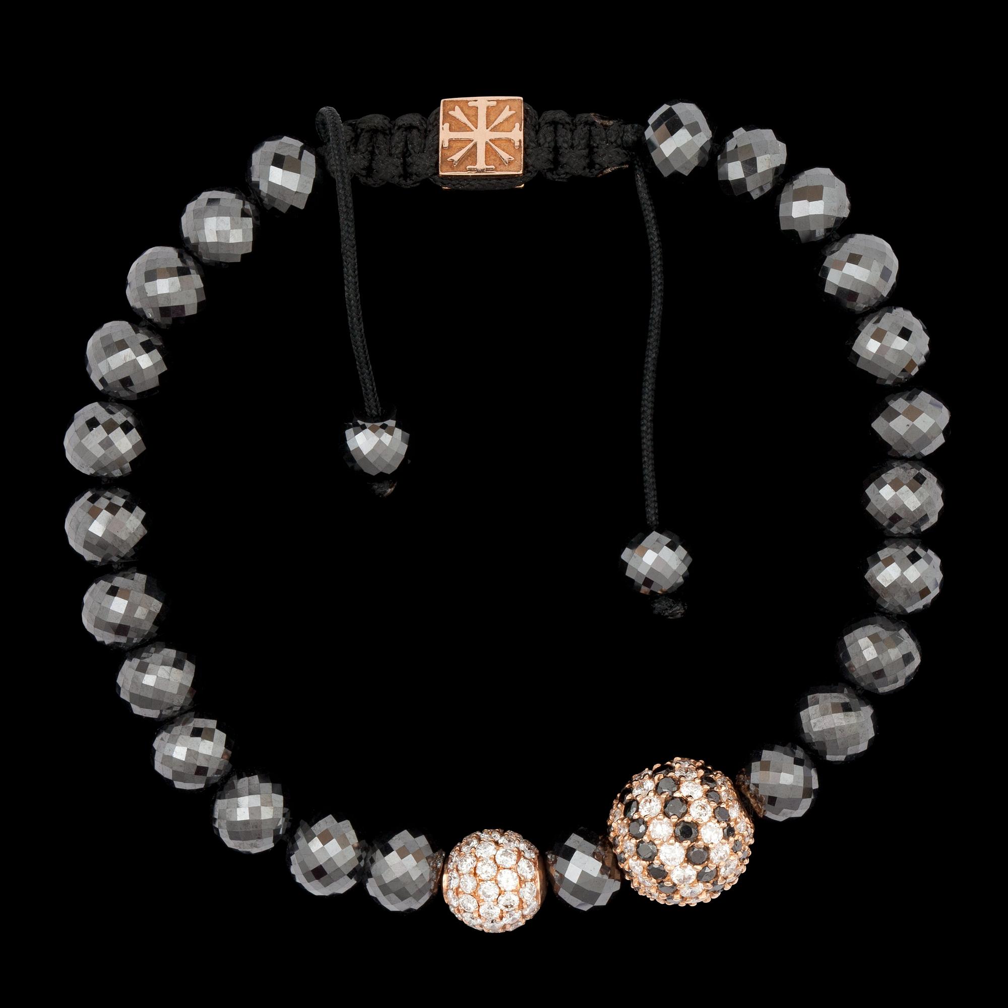 ARMBAND, svarta diamanter kulor, tot 40 ct,  briljantbesatta med svarta och vita diamanter, tot. 1.75 ct.
