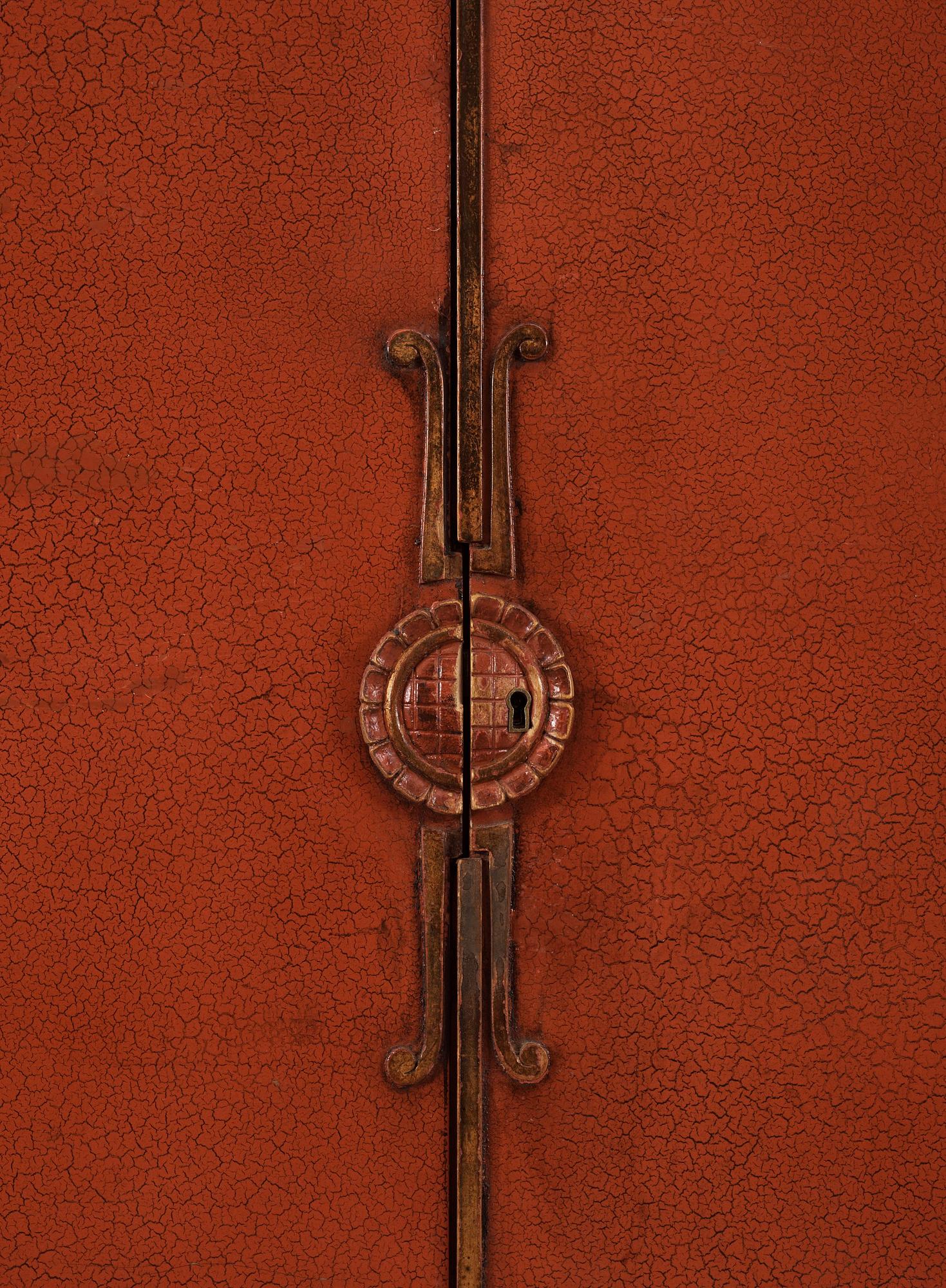 An Axel Einar Hjorth red lacquered wardrobe, 'Åbo', Nordiska Kompaniet 1929.