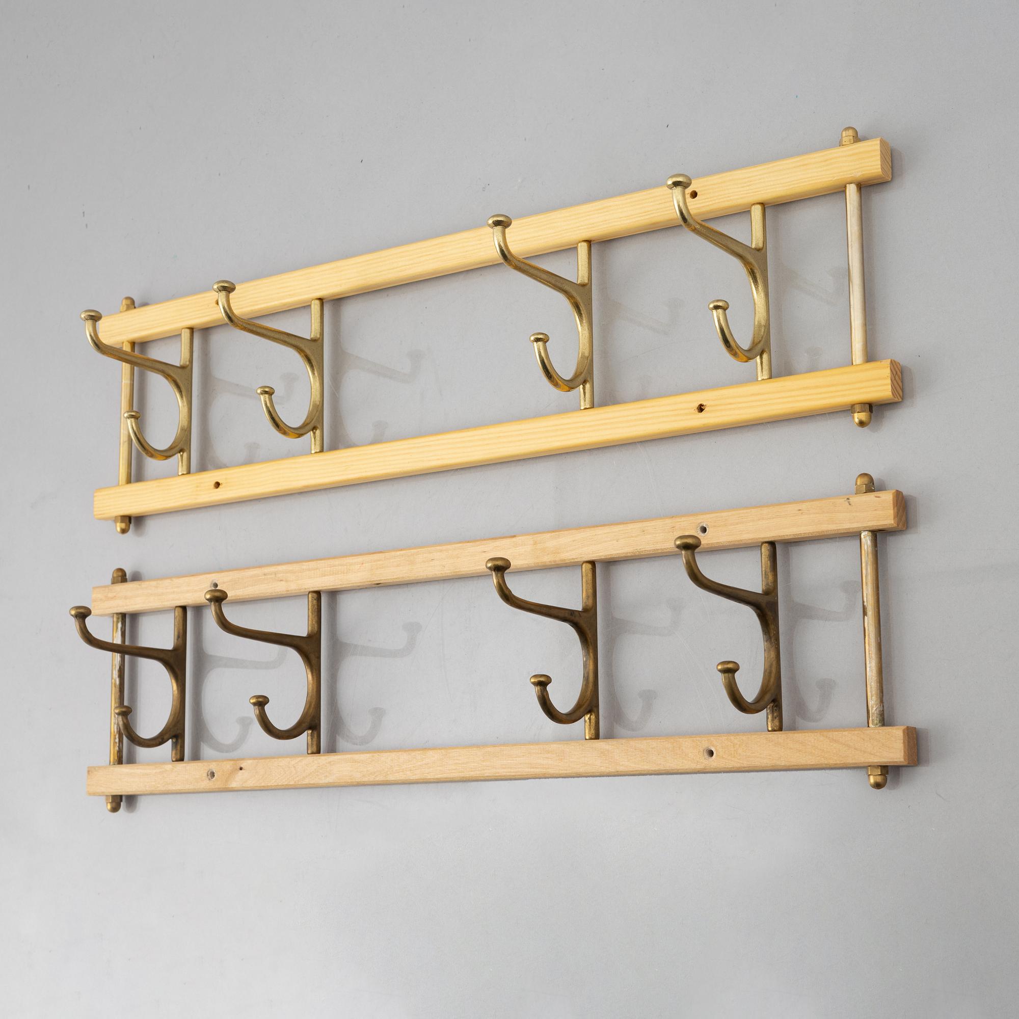 A pair of 'Dekorativ' coat hangers, Skoglunds metallgjuteri, Anderstorp, 1950's/60's.
