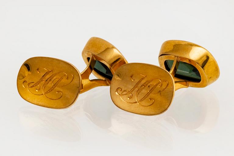 Manschettknappar 18K guld med grön quartz ca 15 x 10 mm, total vikt 10,3 g.