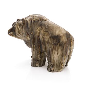 Taisto Kaasinen, a stoneware sculpture, signed T. Kaasinen Arabia Finland.