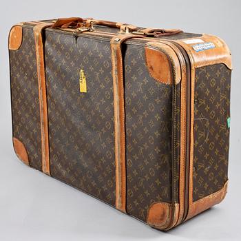 A 1980s monogram canvas suitcase by Louis Vuitton.