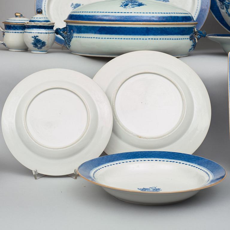 A blue and white dinner service, Qing dynasty, circa 1800. (90 pieces).