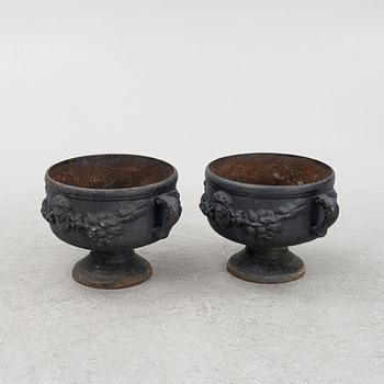 Garden urns, a pair, cast iron, 20th century.