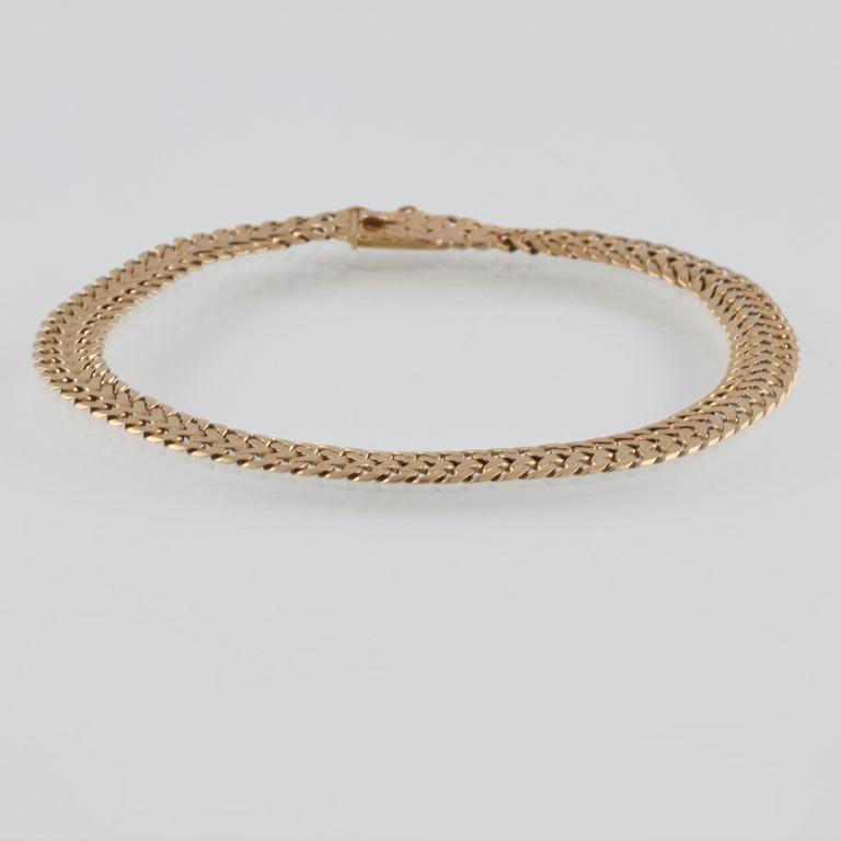 ARMLÄNK, 18K guld, importstämplad. Vikt 8,1 gram.