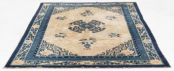 A Chinese Antique Finish rug, c. 278 x 186 cm.