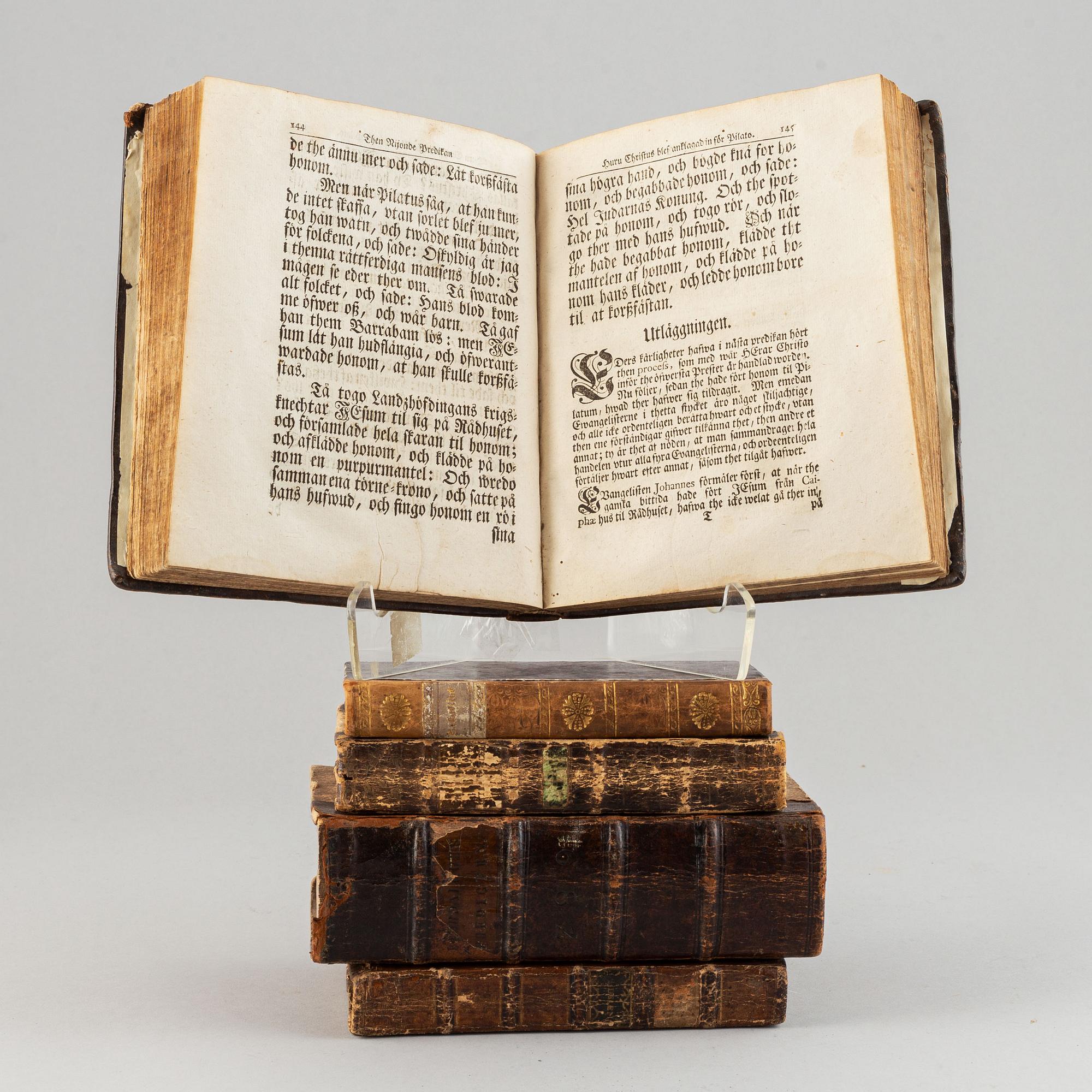 Five 18th century books.