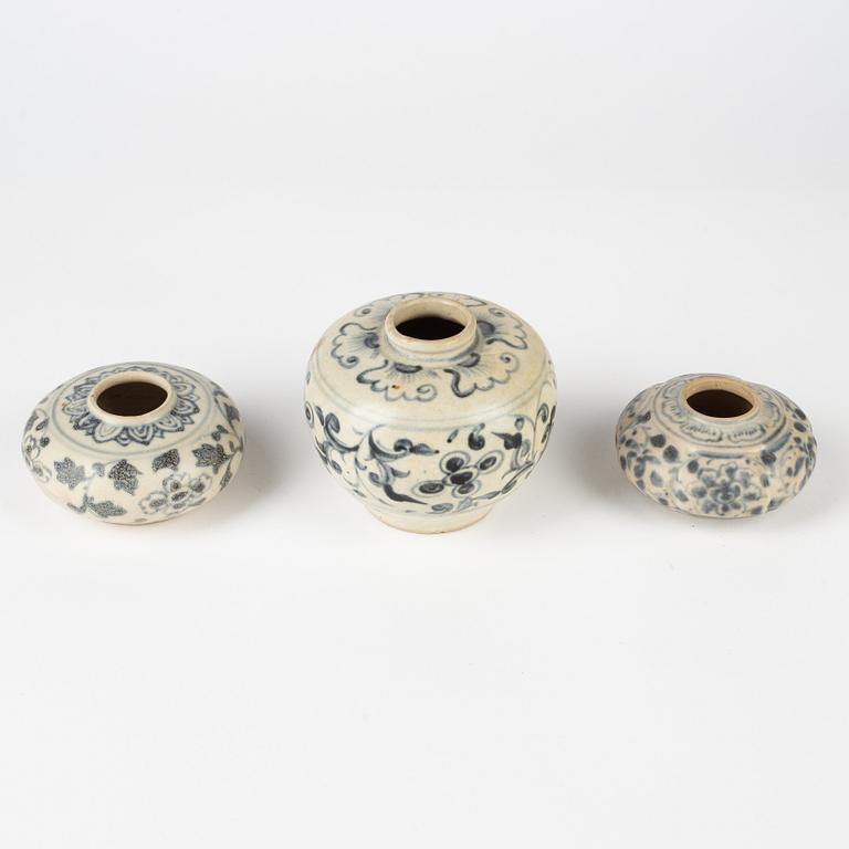 Two blue and white brush washers and a miniature pot, South East Asia, 15th/16th Century.