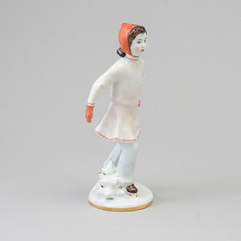 A early 20th century porcelain figurine from Russia.