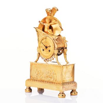 A French Empire mantle clock, early 19th century.