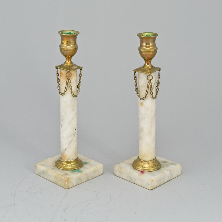 Two similar late gustavian  candlesticks, ca 1800.