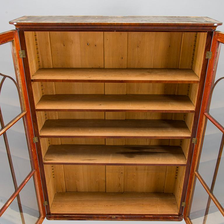 A 1830s/40s mahogany book case cabinet.