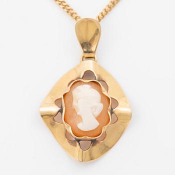 18K gold pendant with a shell cameo and an 18K gold chain.