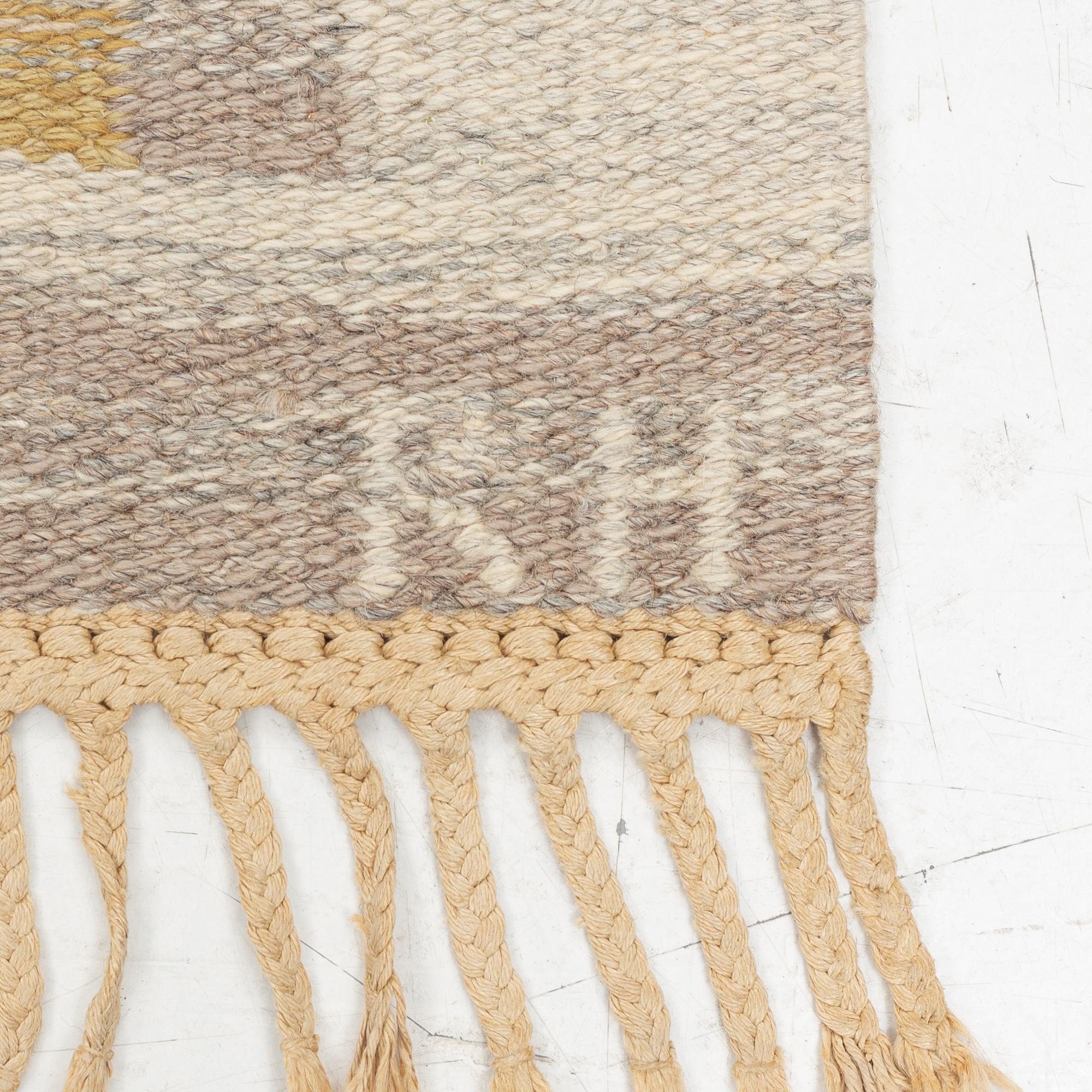 Mary Sandberg, a carpet, flat weave, circa 250 x 170 cm, signed MS KH.
