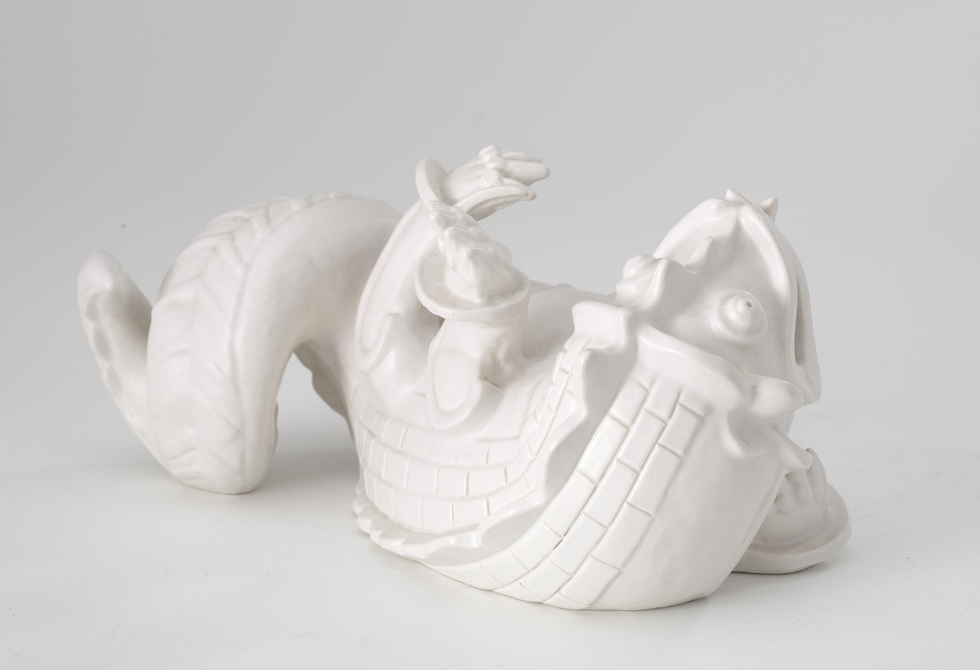 A Wilhelm Kåge stoneware figure of a dragon, Gustavsberg circa 1940.