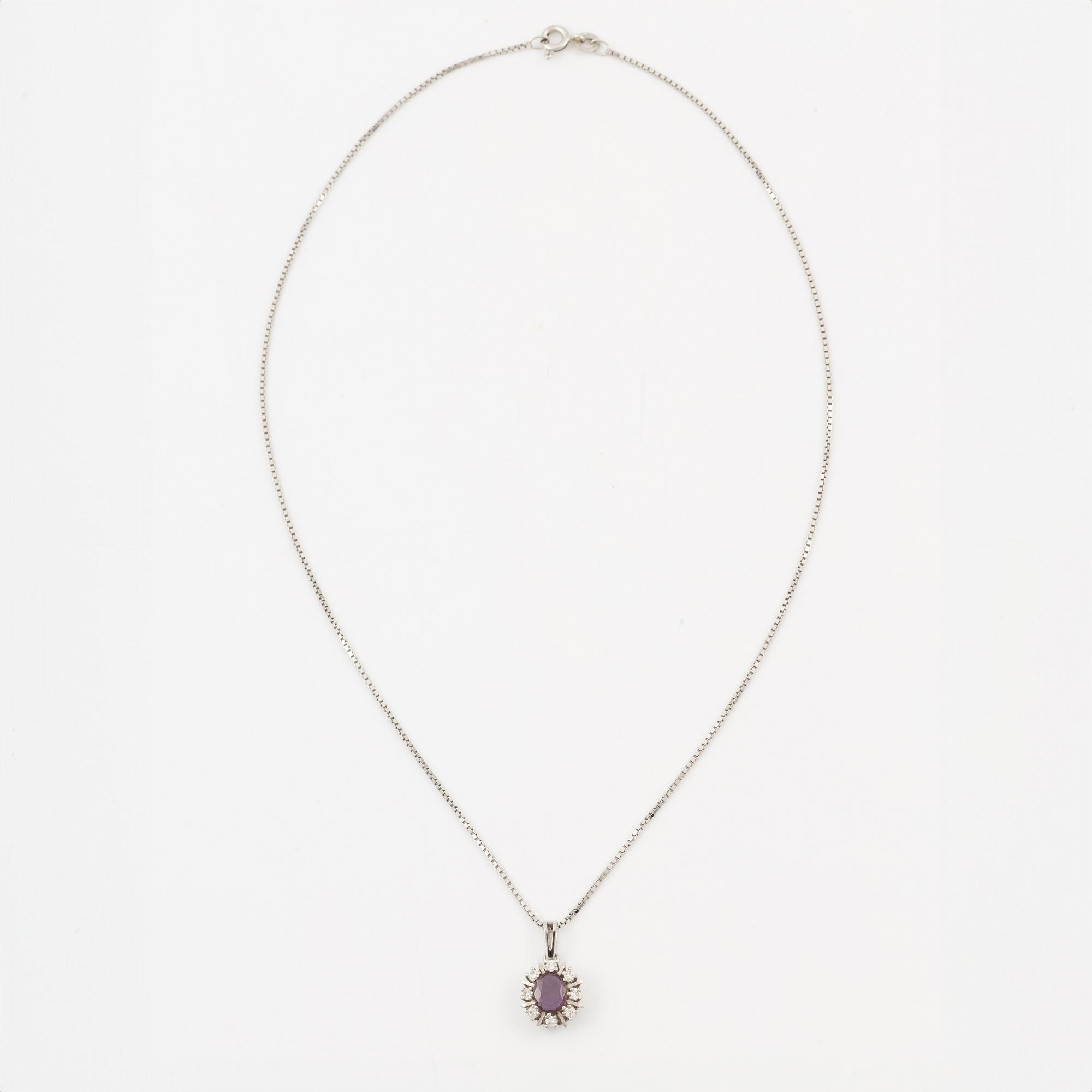 Pendant with gold chain, 
Pendant with white gold chain, 
Earrings a pair, rubies with brilliant-cut diamonds.