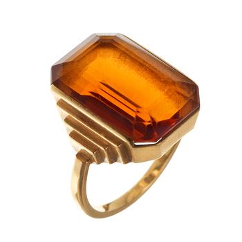 812. A Wiwen Nilsson 18k gold and facet cut citrine ring, Lund 1931.