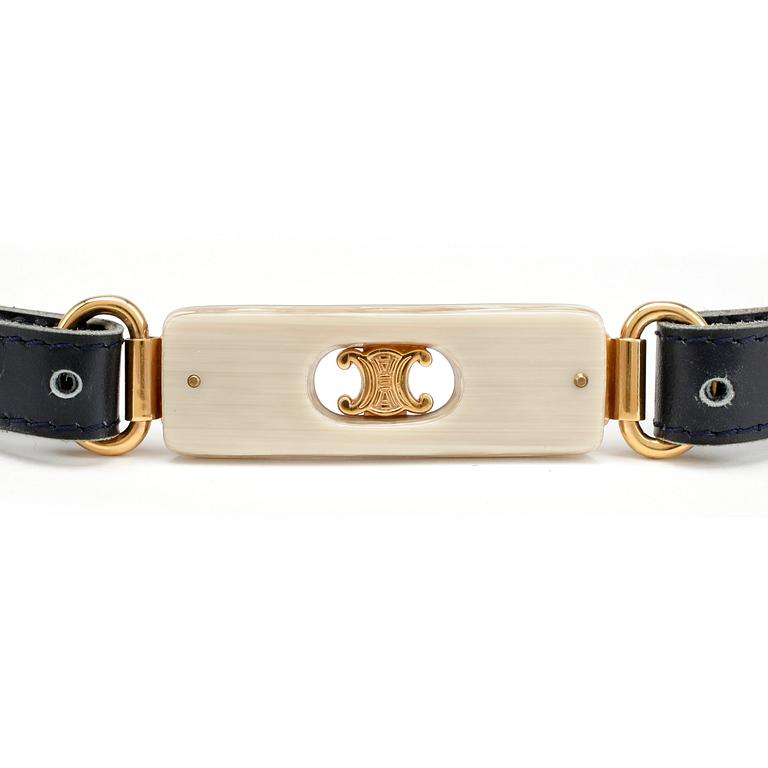 CÉLINE, a blue leather belt.