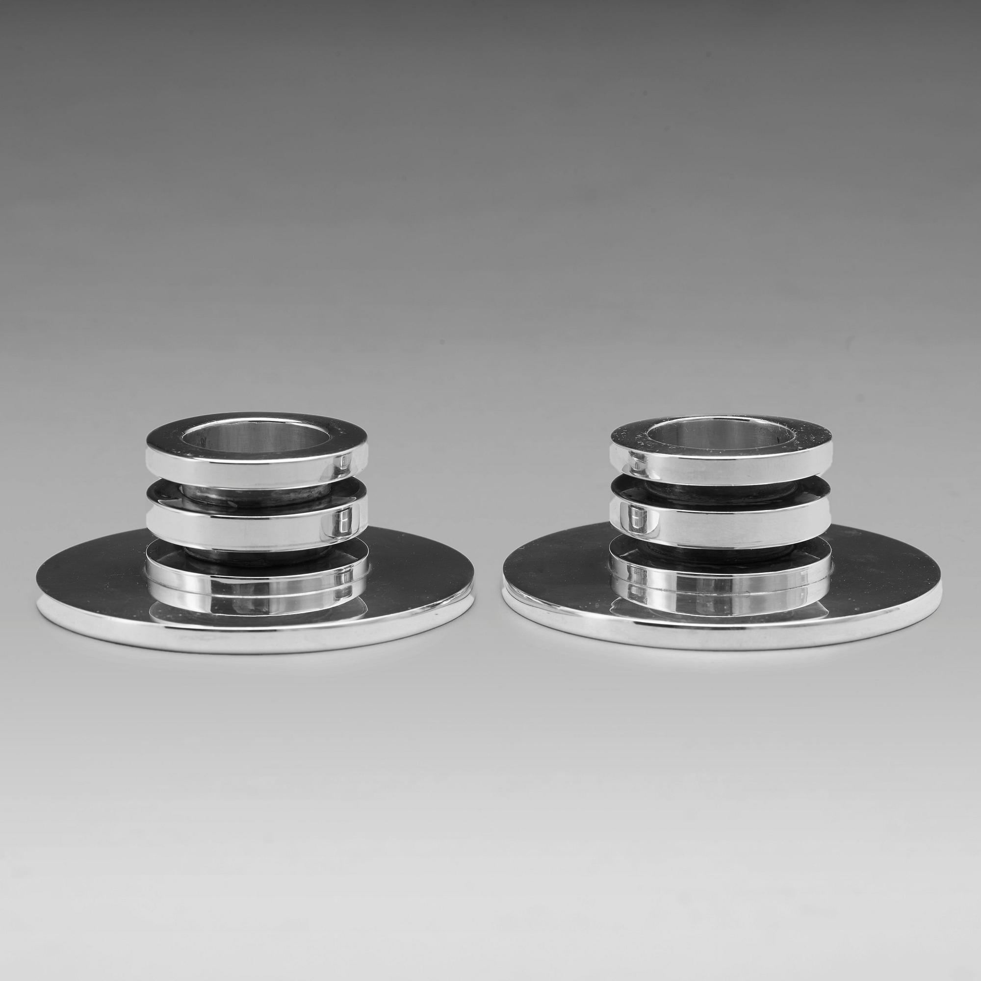 Harald Nielsen, a pair of "Pyramid" sterling candlesticks, Georg Jensen, Copenhagen, post 1945, model nr 747A.