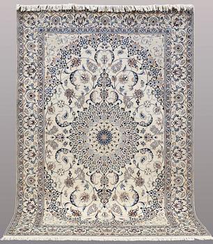 A CARPET, Nain part silk, s.k 9LAA, ca  303 x 202 cm.