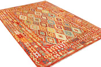 A Kilim carpet, c. 343 x 247 cm.
