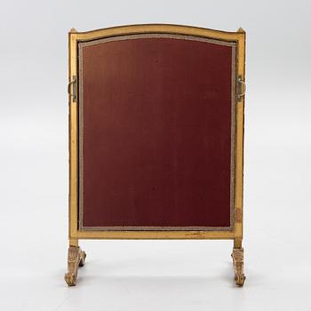 A Louix XVI-style fire guard, late 19th century.