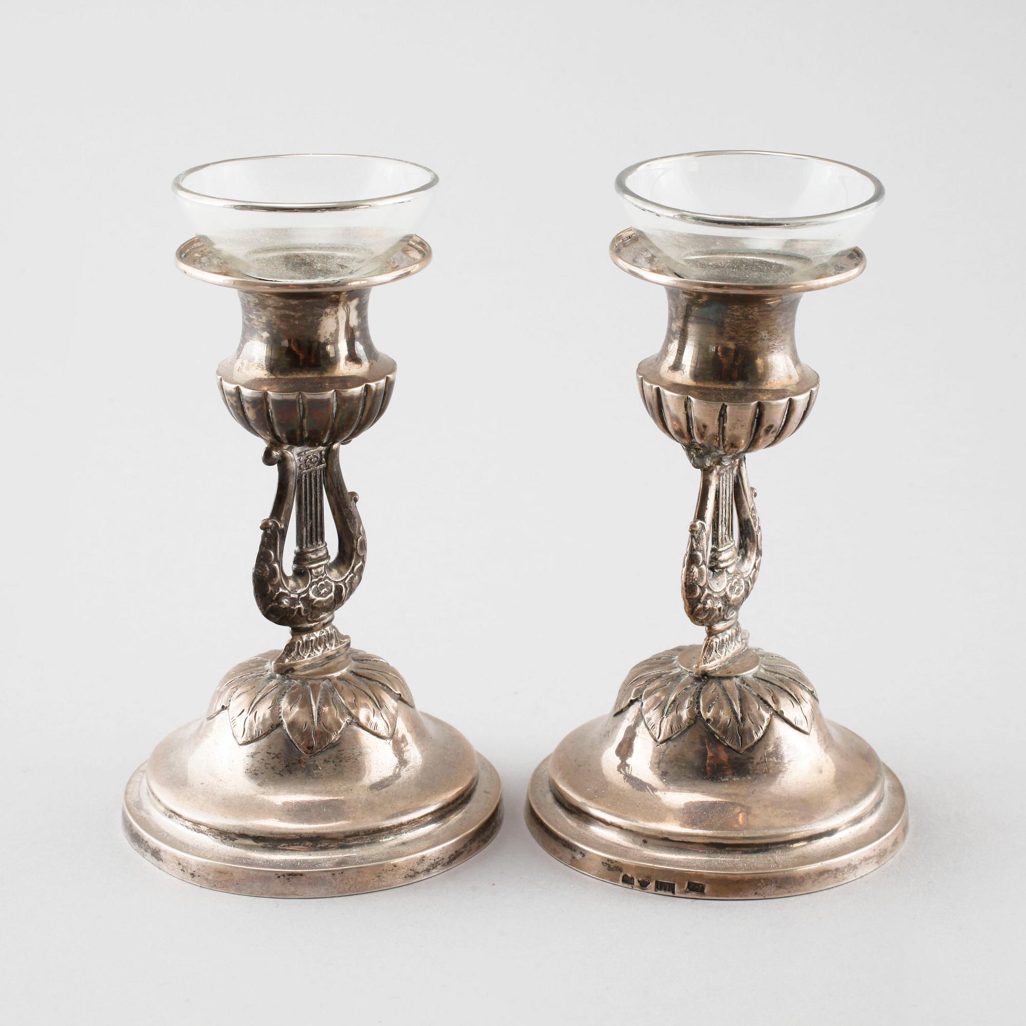 A pair of silver candelsticks by Daniel Eklund, Kalmar, empire, 1854, weight 163.