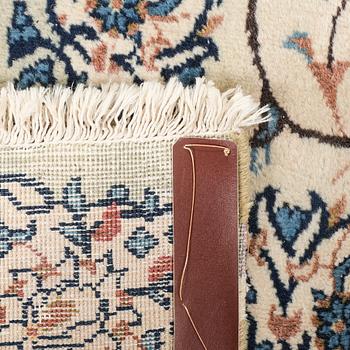 An ols Kerman carpet ca 404x303 cm.