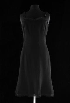 A black cocktail dress by Chanel, spring 2004.