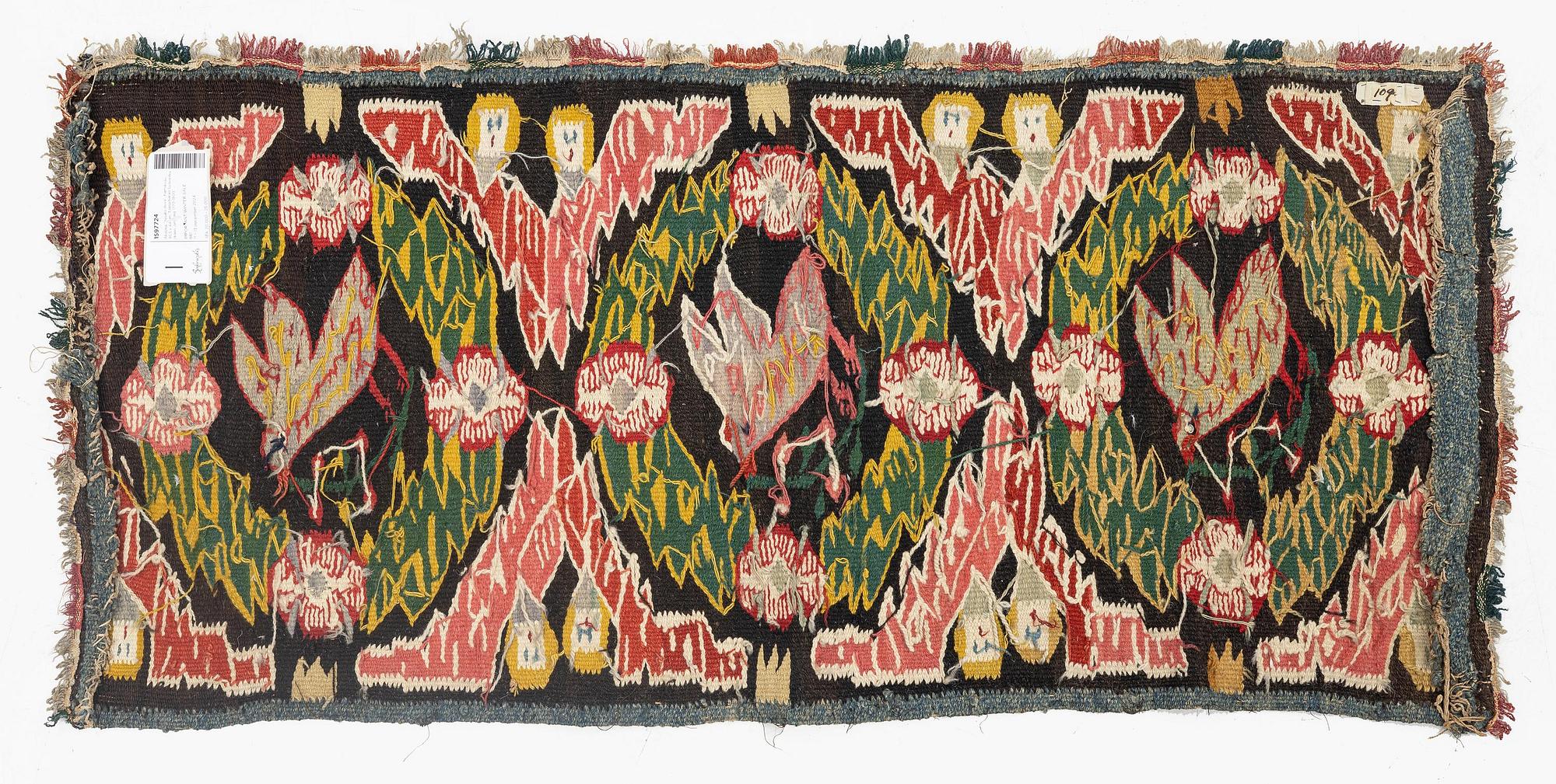 A carrige cushion, "Noaks duva" ('Noah's dove'), tapestry weave, c. 95.5 x 44 cm, Torna district, Southwestern Scania.