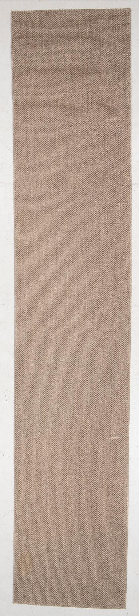 A runner carpet from NTK Atelier, Sweden, c. 448 x 87 cm.