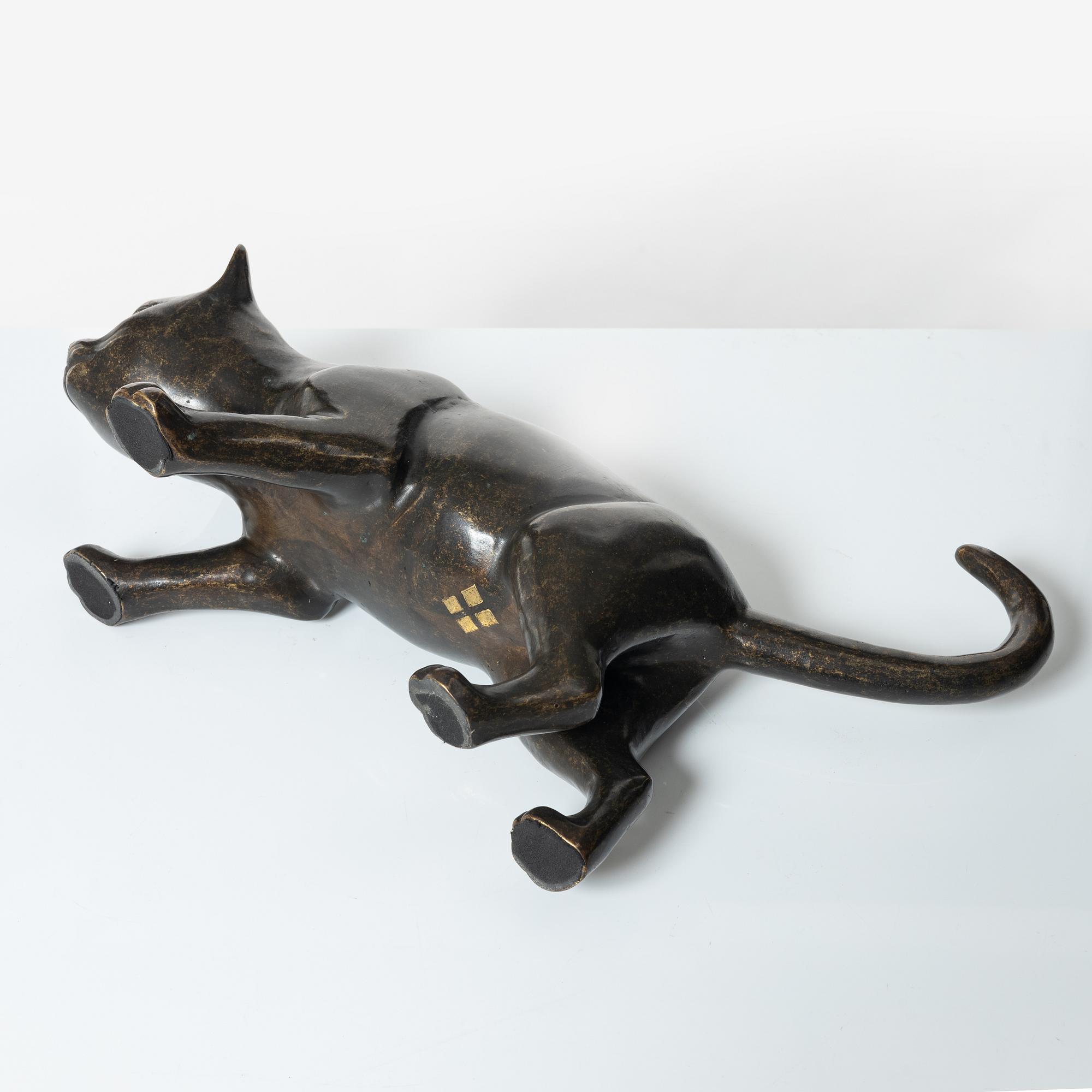 A decorative bronze sculpture, Fyrklövern.