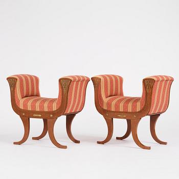 A pair of Swedish Royal Empire stools.