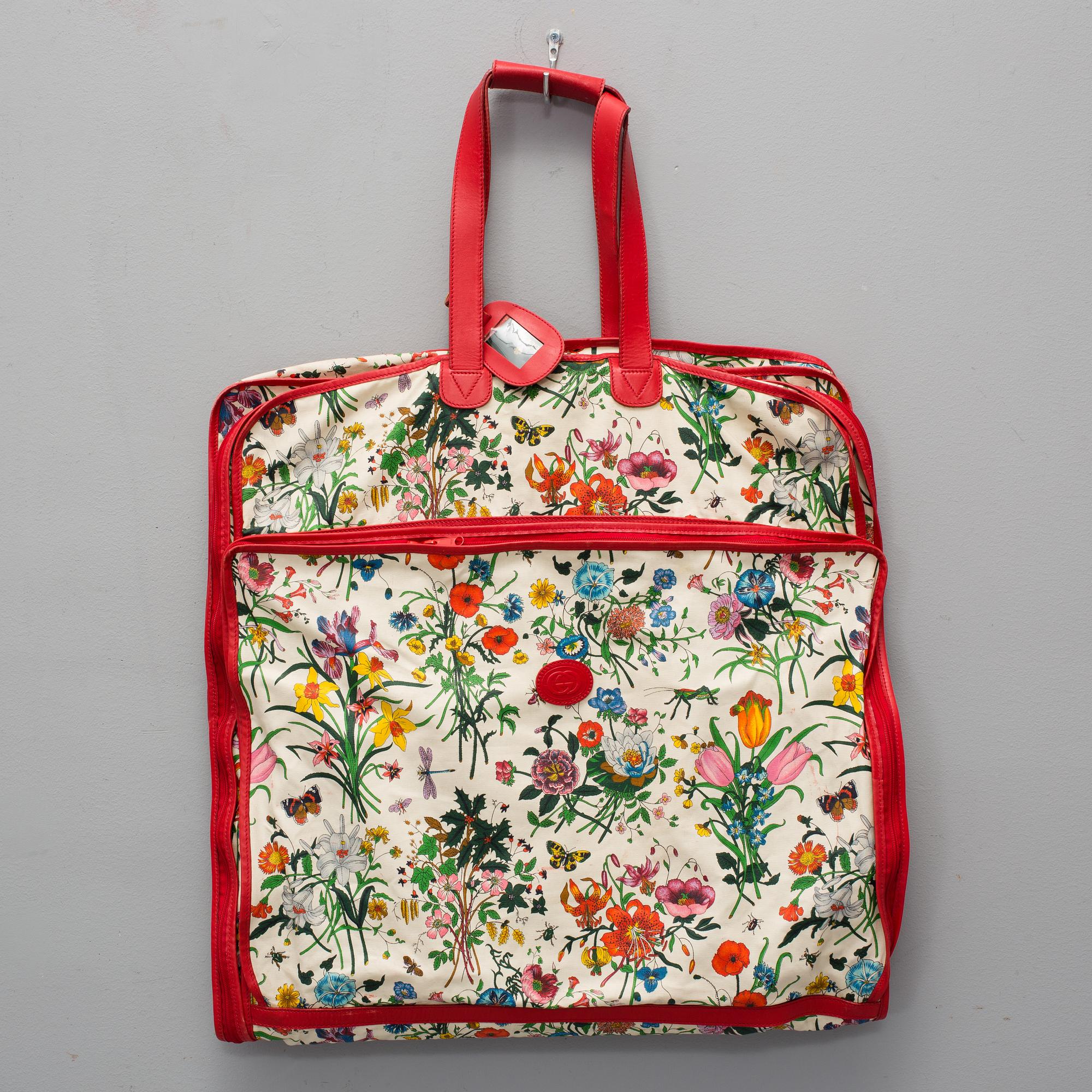 GUCCI, a 'Flora' garment bag.