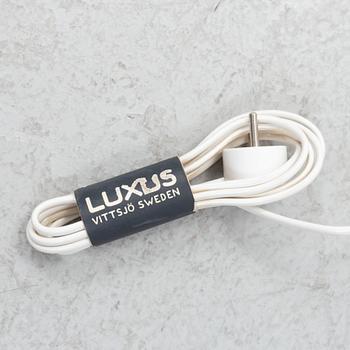 Uno & Östen Kristiansson, a pair of rosewood veneered floor lights, Luxus, Vittsjö, 1960's.