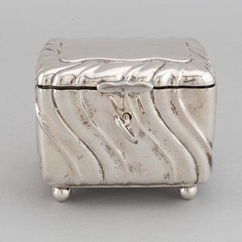 A 20th century parcel-gilt silver sugar-box, Swedish import marks from 1919.