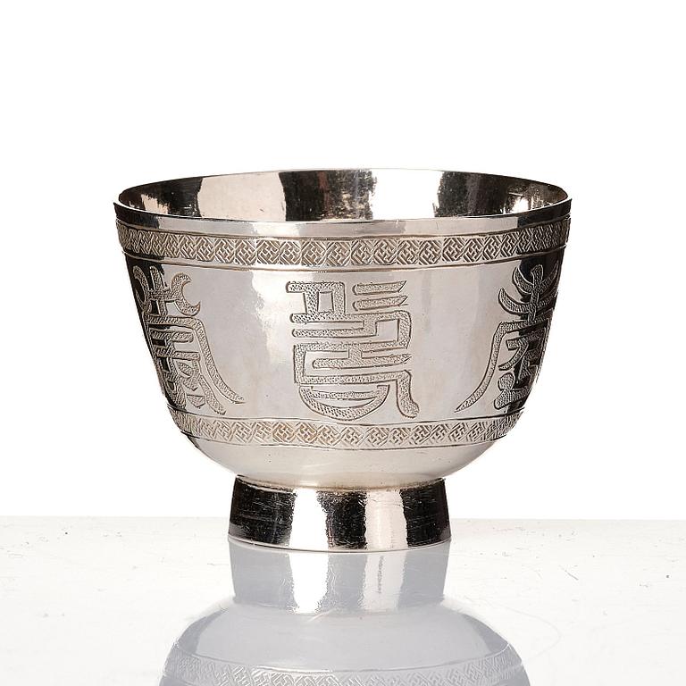A set of six silver cups with holders, China, 20th century.