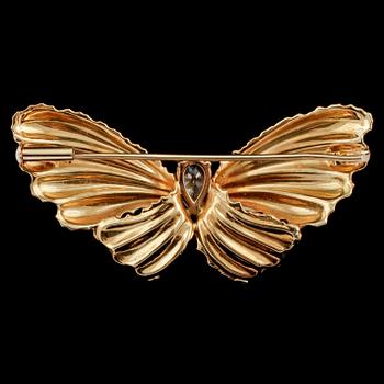 BROSCH, 18k guld med fasettslipat glas, importstämplad, 1900-talets tredje kvartal. Vikt 5 g.