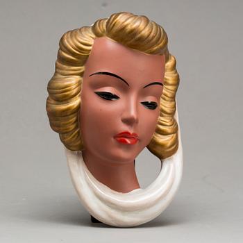 An Adolf Prischl terracotta wall mask for Goldscheider, mid 1900.