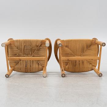 Rainer Daumiller, a set of four pine armchairs, Denmark, 1960s/70s.
