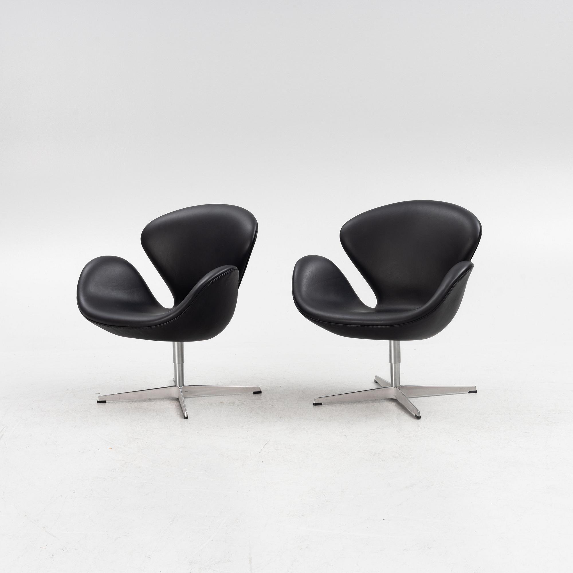 Arne Jacobsen, a pair of "Swan" armchairs, Fritz Hansen, Denmark, 2007.