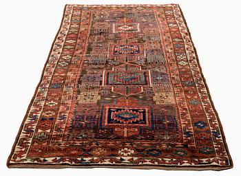 An antique Kurdish / Turkish carpet by the Herki Tribe, ca 276 x 116 cm.