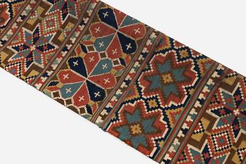 A flat weave 'Rosettes', Bench cushion c. 205 x 50 cm, Southwestern Scania, Sweden, first half of the 19th century.