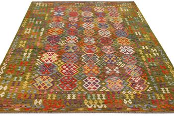 An Afghan Kilim carpet, c. 357 x 266 cm.