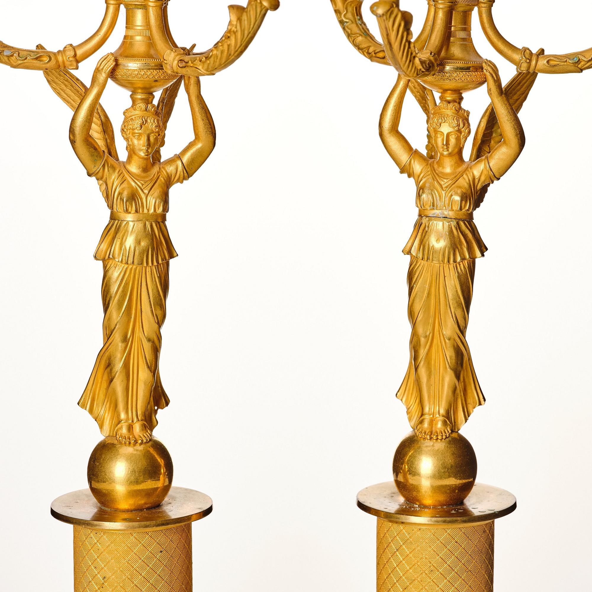 A pair of Empire candelabras for four lights, beginning of the 19th century.